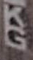 The letters K and G written from top to bottom