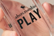 The Moose Design as well as abercrombie and play appear on a perfume bottle.