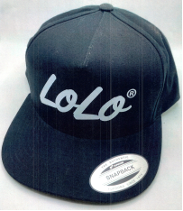A black baseball hat with the word LoLo in large stylized white font immediately followed by a trademark registration symbol on the front. A round sticker on the brim reads "The Authentic Snapback."